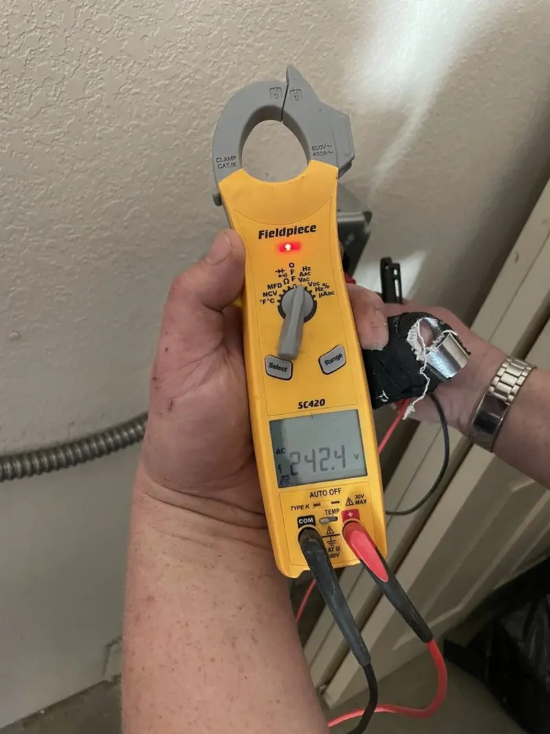 Voltage testing with clamp meter during Electrical Installation Services in Bothell